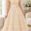 Ivory crochet shell lace midi dress with square neckline, cap sleeves, and satin waist ribbon bow